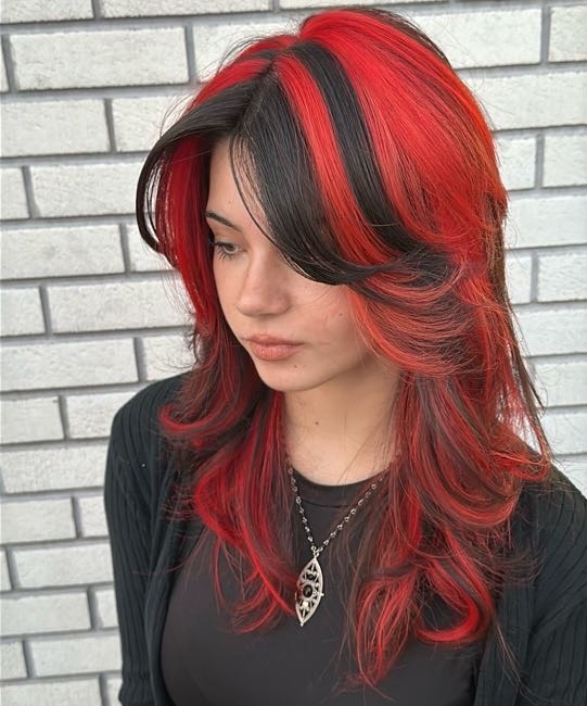Salon Halo is the best vivid color salolnn. Denayza is one of our stylists at our vivid color hair salon. This red look was custom blended.